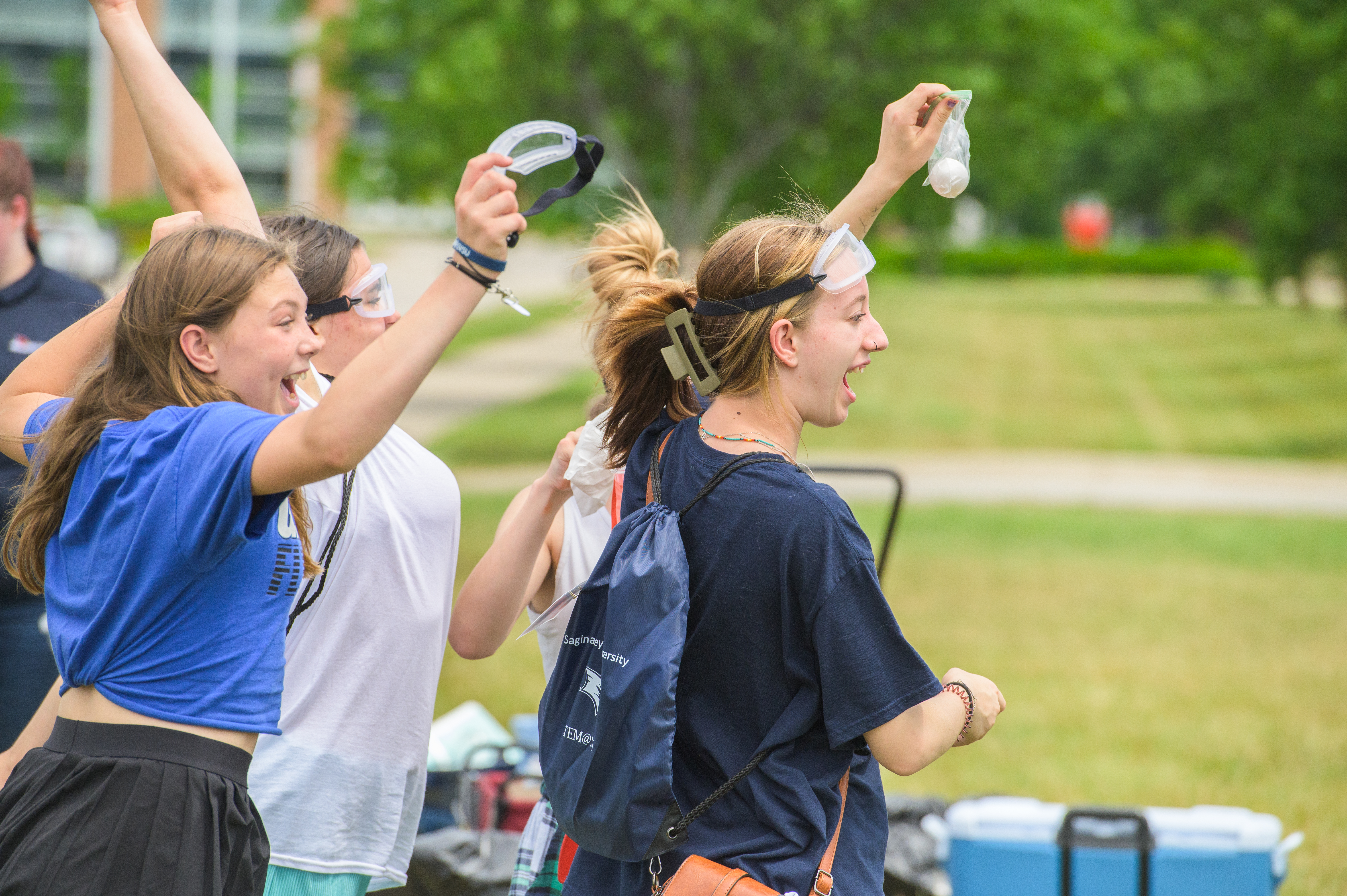 Students celebrating success during the STEM Summer Design Challenge.